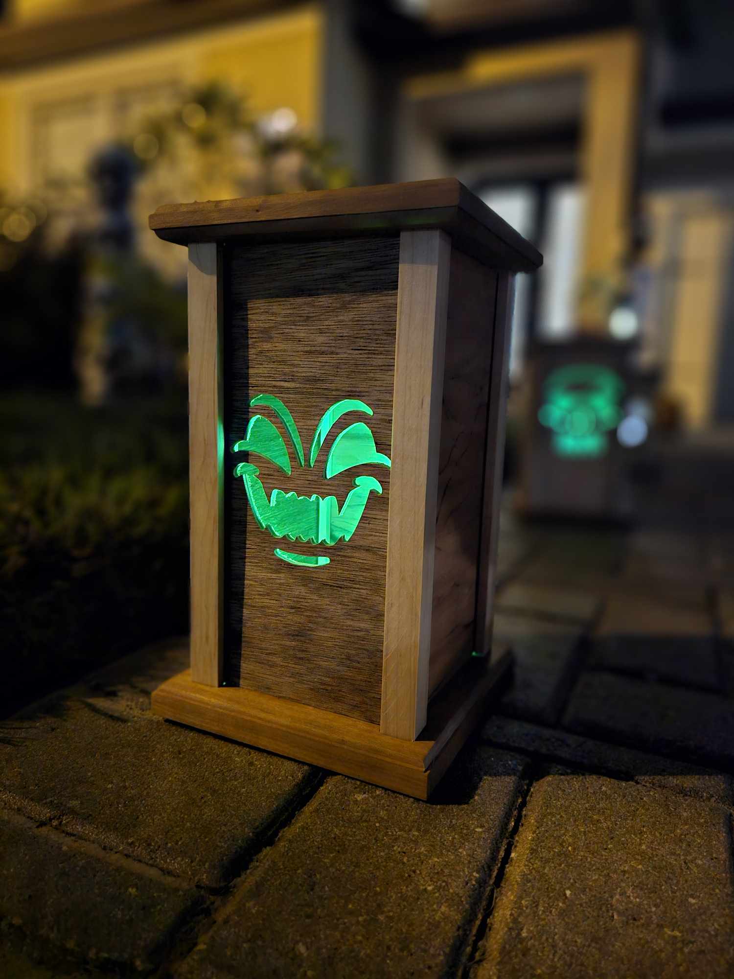 Wooden lantern face showing a demon face.
