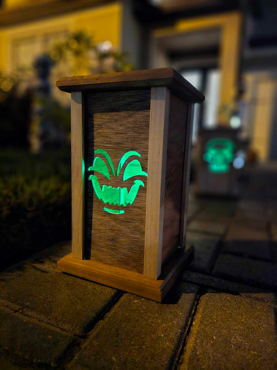 Wooden lantern face showing a demon face.
