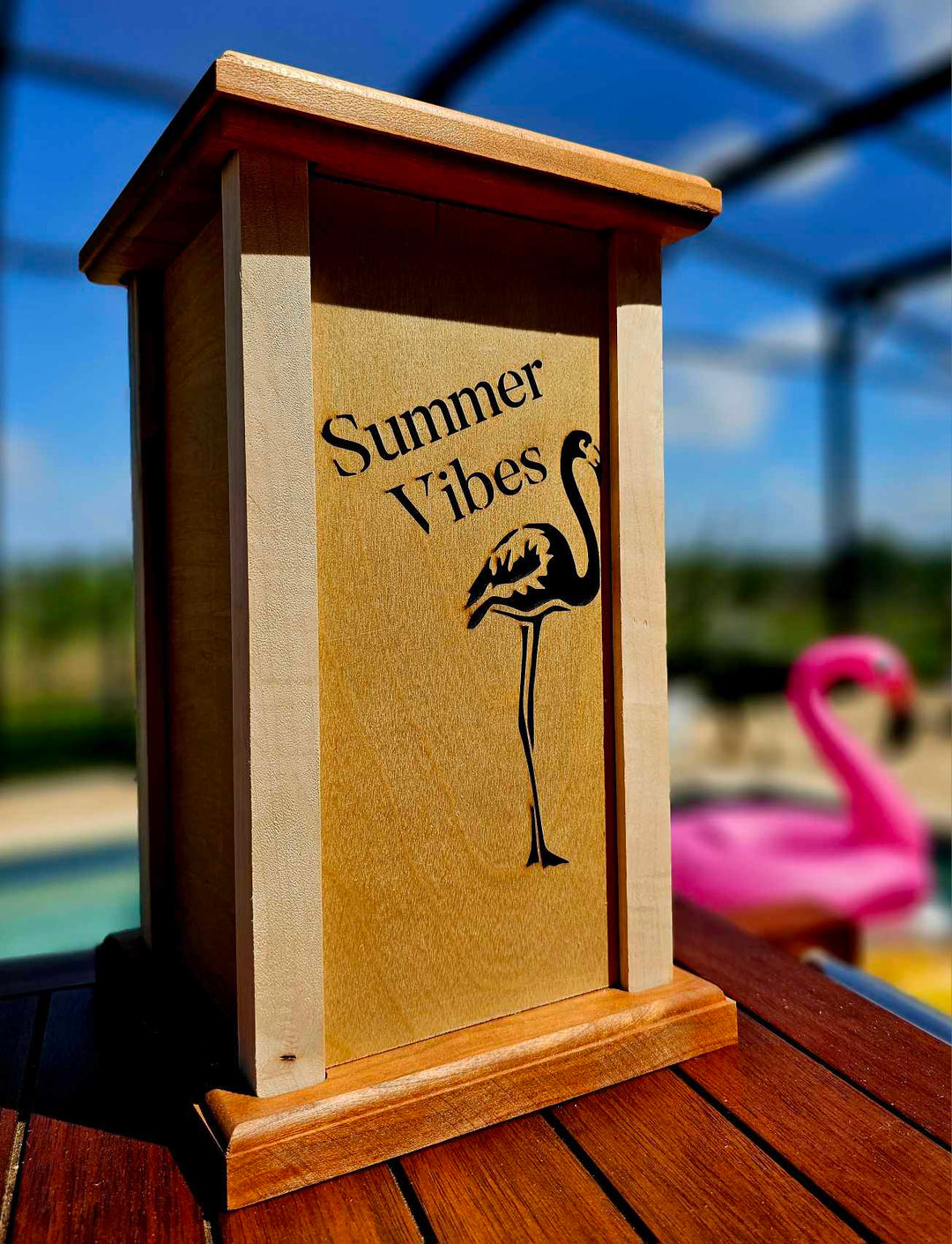 Wooden Lantern face showing a single flamingo with the words Summer Vibes.