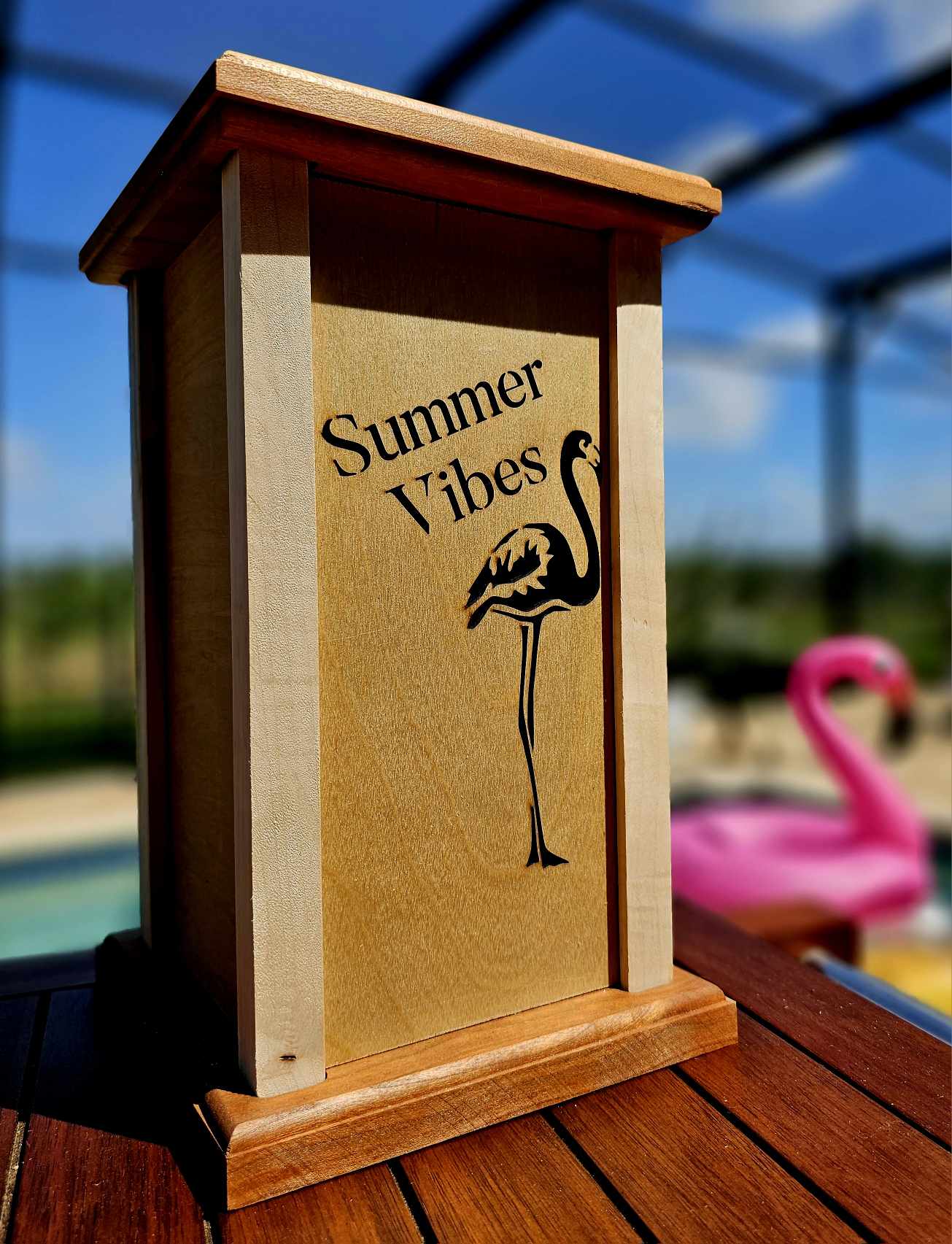 Wooden Lantern face showing a single flamingo with the words Summer Vibes.